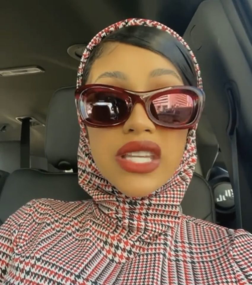Bottega Veneta BV1088S red mirror sunglasses on face with oversized tinted lenses