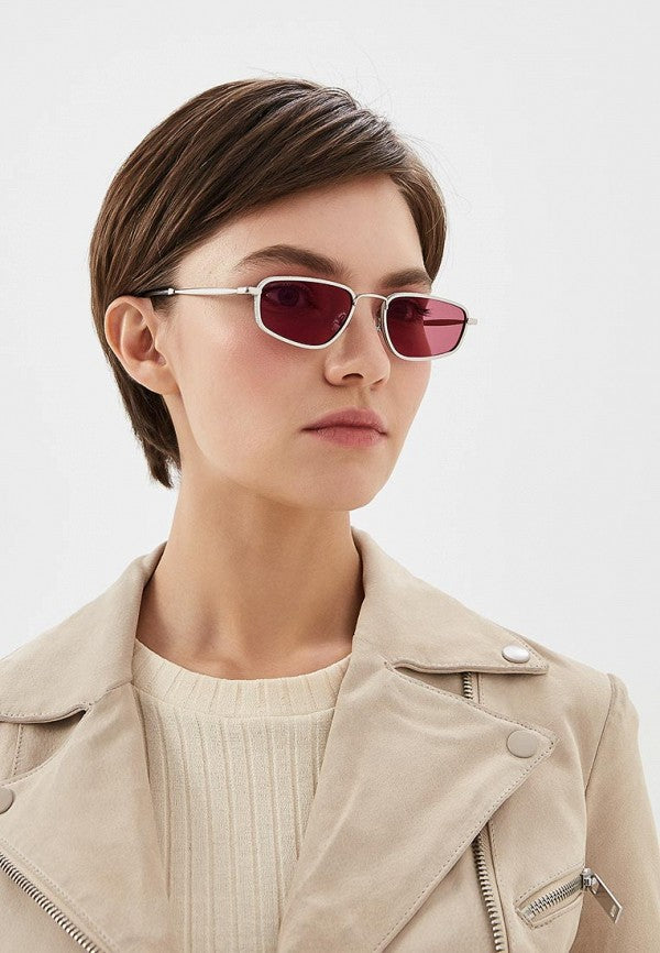 Silver metal glitter sunglasses with purple tinted lenses and cat-eye frames