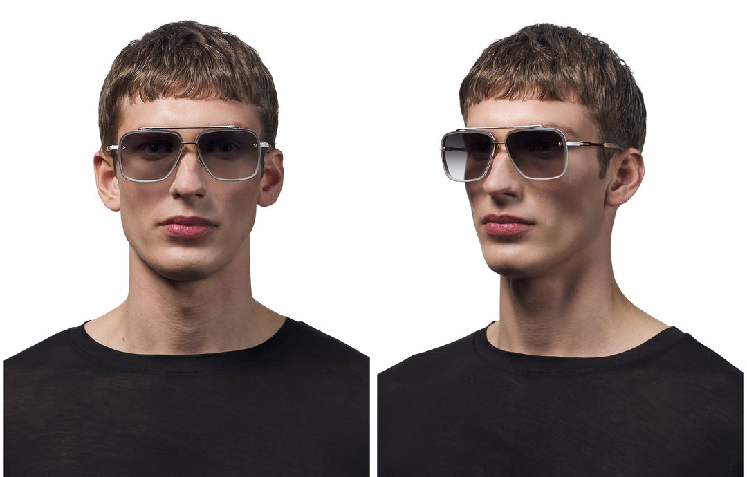 Dita aviator sunglasses on model, yellow gold thin frame with dark lenses