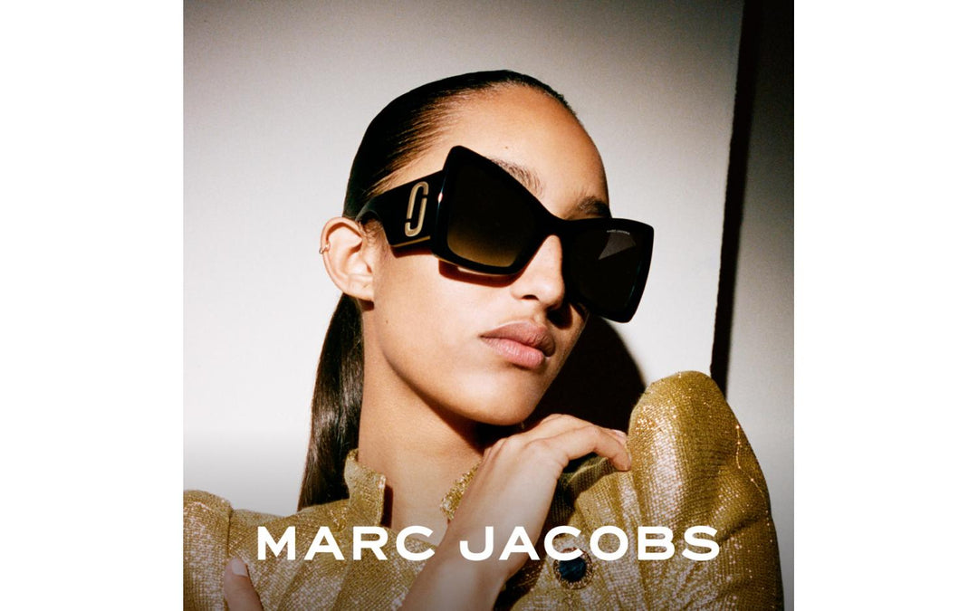 Marc Jacobs cat-eye sunglasses on model, black lenses and frames