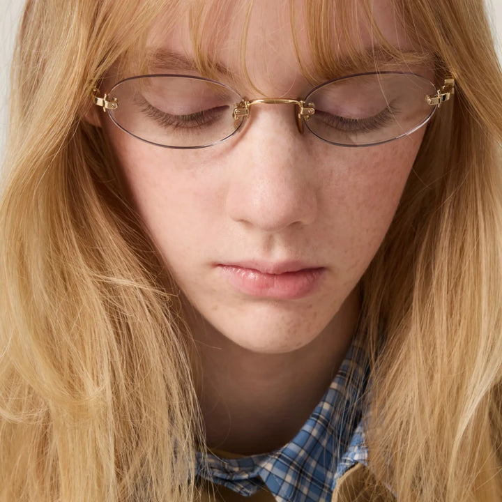 Miu Miu MU A54S Gold Bluelight Oval Rimless Sunglasses