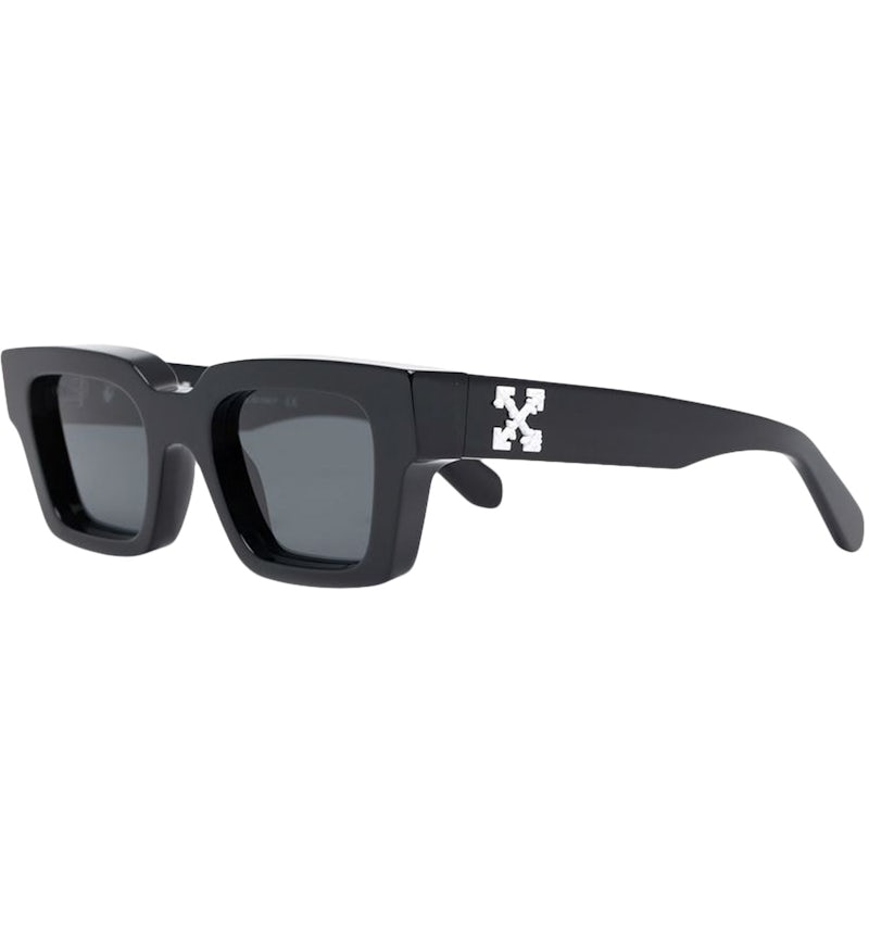 Black rectangular sunglasses with Off White logo on temple, dark tinted lenses