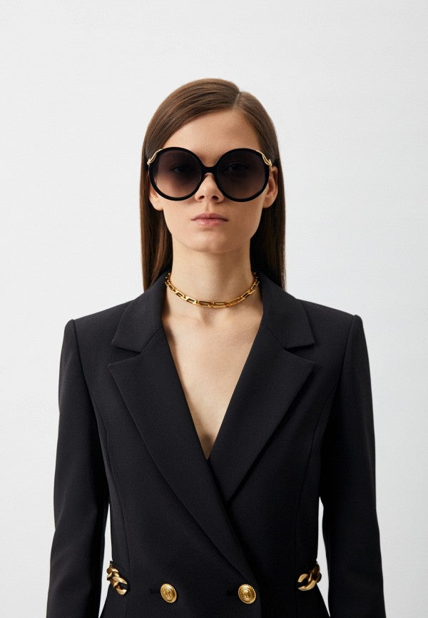 Gafas de sol ovaladas de pierna baja en negro Gucci GG1235S