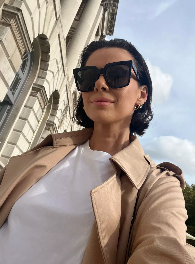 Celine black square polarized sunglasses on face, dark lenses and thick frame