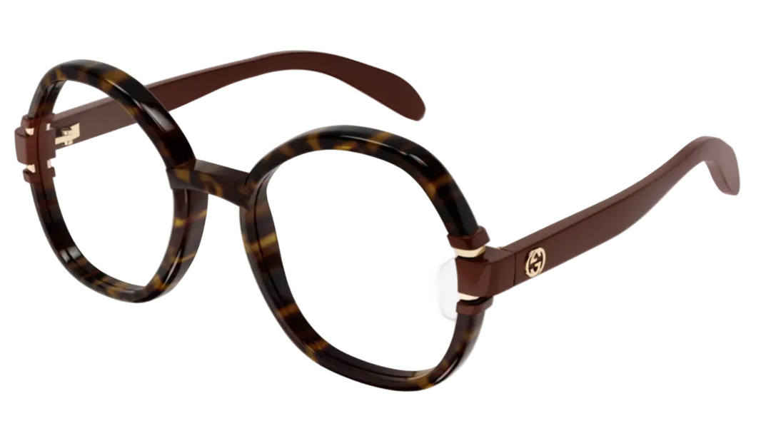 Gucci oversized round eyeglasses in brown tortoiseshell acetate with gold-tone hardware and a Gucci logo on the temple, shown on a plain white background.