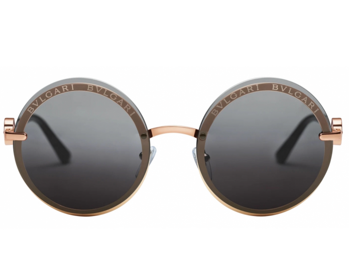 Front view of round grey-tinted sunglasses with rose-gold metal frames and dark lenses