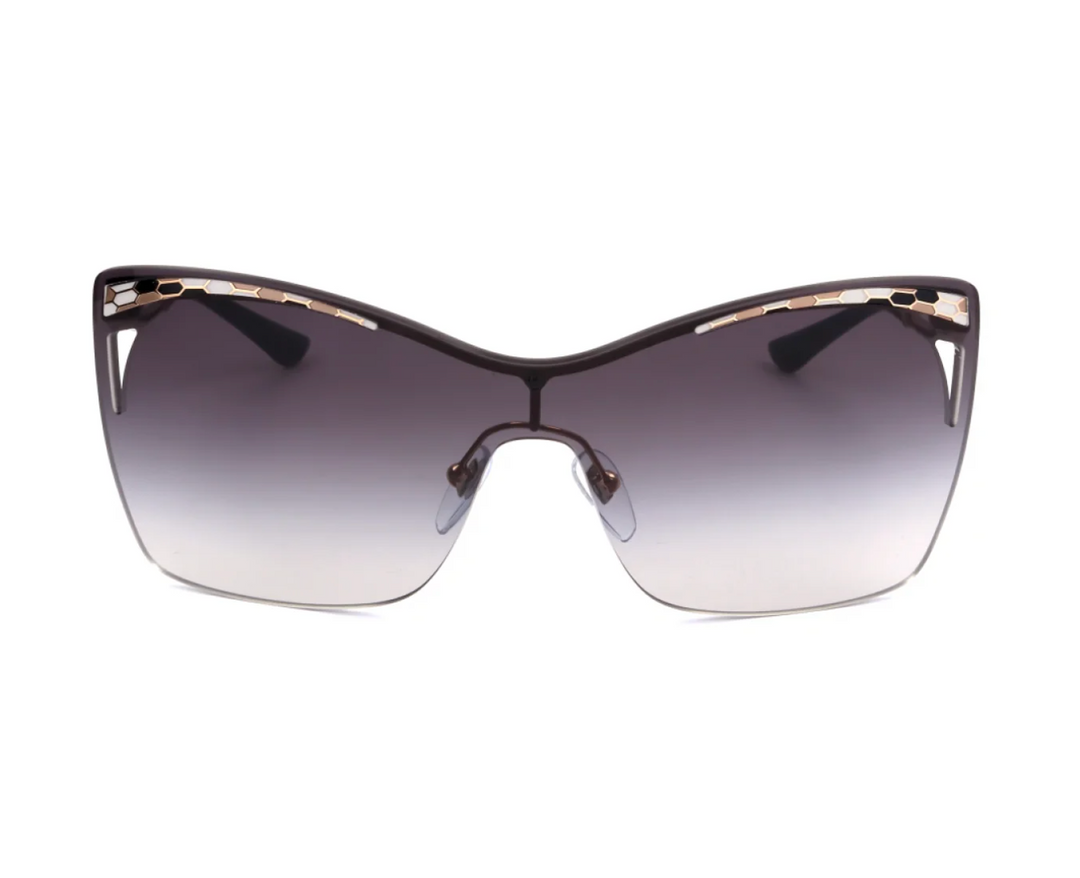 Gold-accented black cat-eye mask sunglasses with dark gray gradient lenses