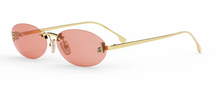 Fendi First front view gold thin-frame round sunglasses with red tinted lenses