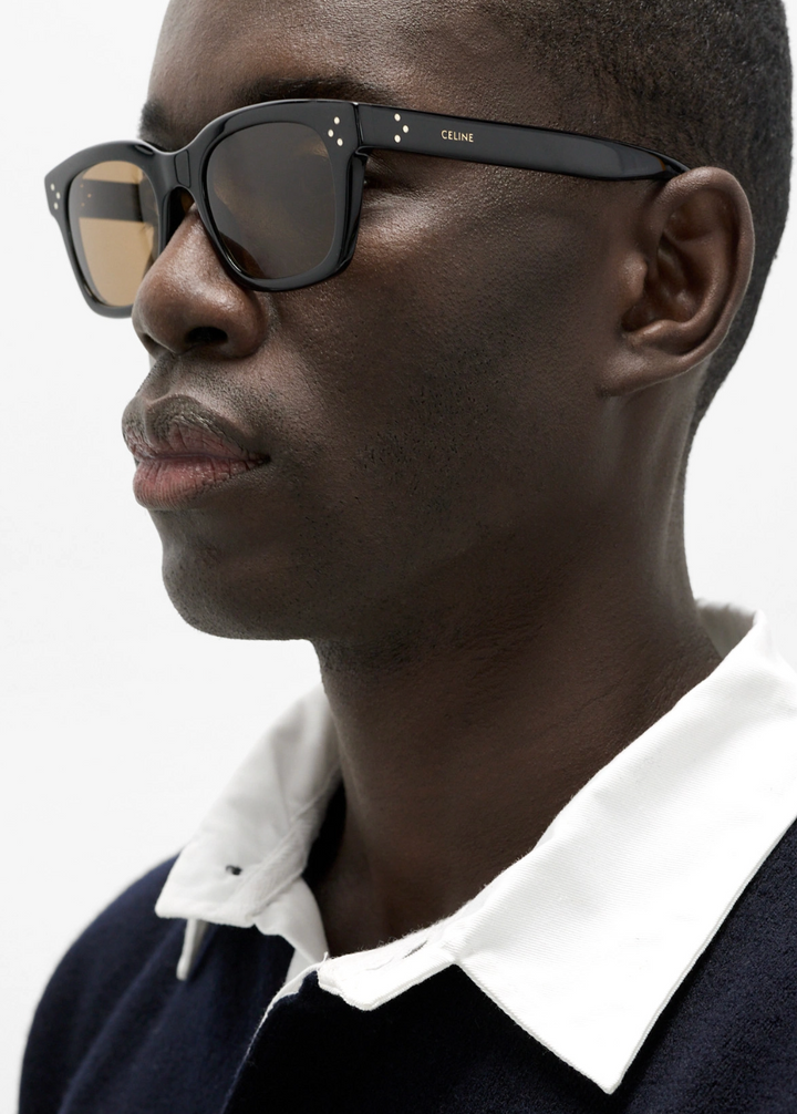 Black unisex sunglasses on a man&