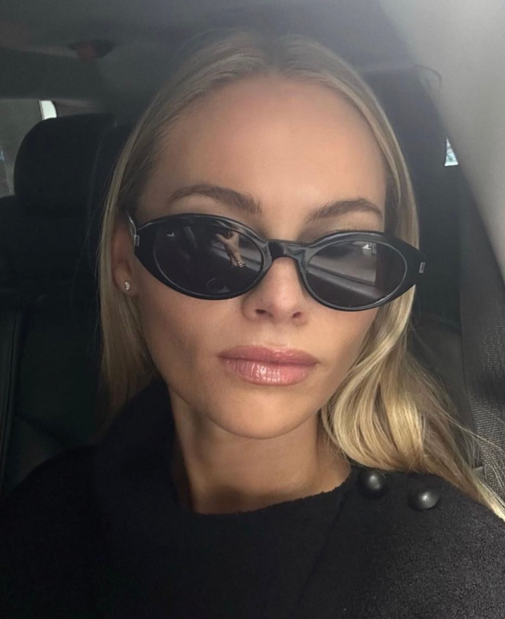 Saint Laurent SL567 Oval Sunglasses in Black