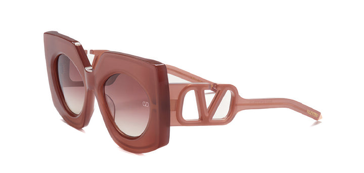 Valentino V-Soul pink oversized V-shaped sunglasses with thick frame and tinted lenses