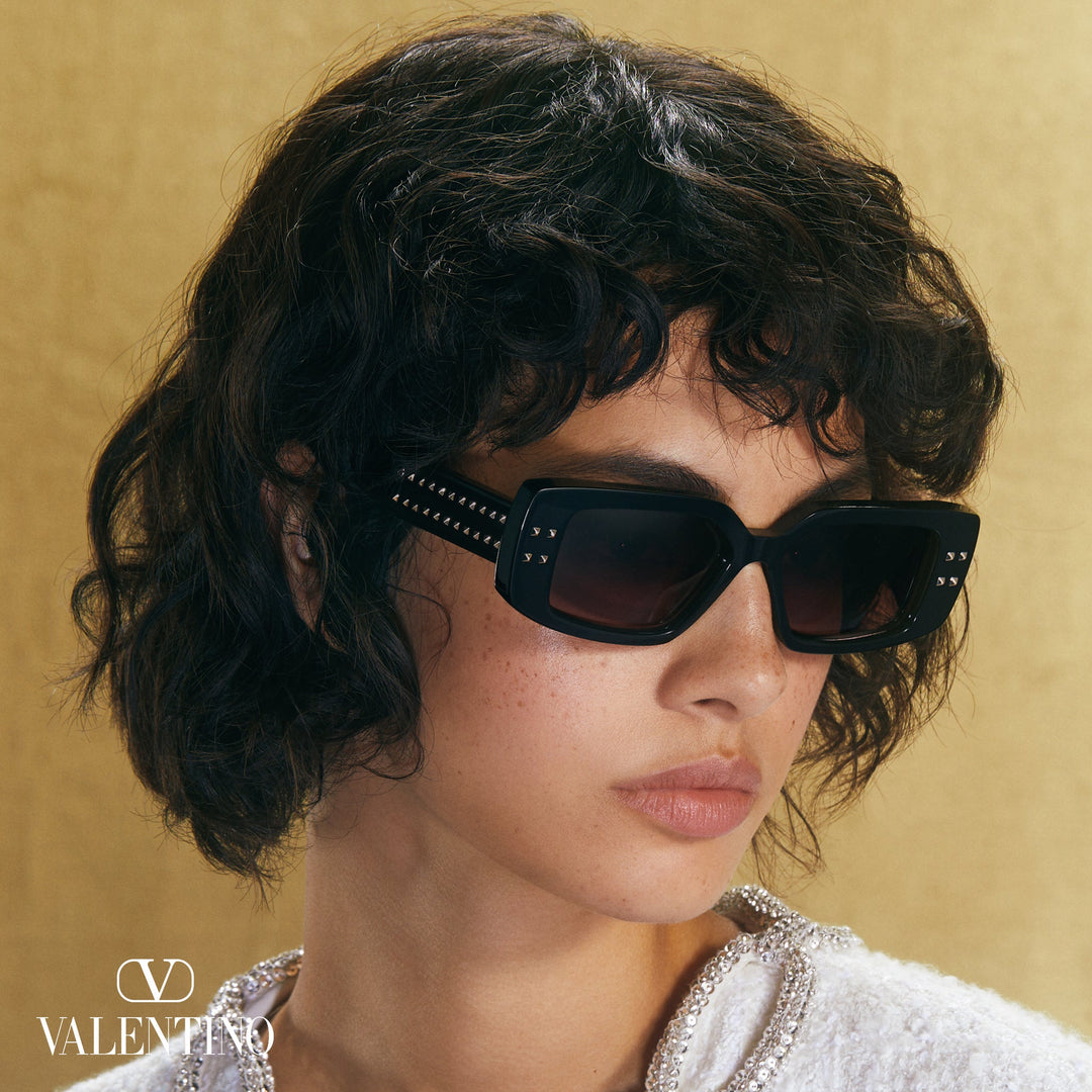Black rectangular Valentino V-Cinque sunglasses with studded temples, brown tinted lenses