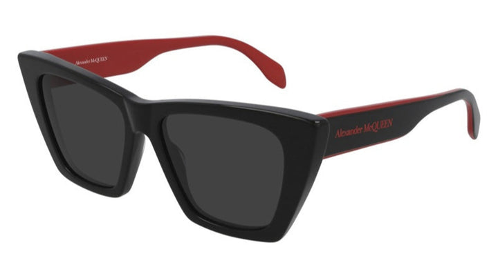 Alexander McQueen AM0299S black cat-eye sunglasses with dark lenses and red temple arms