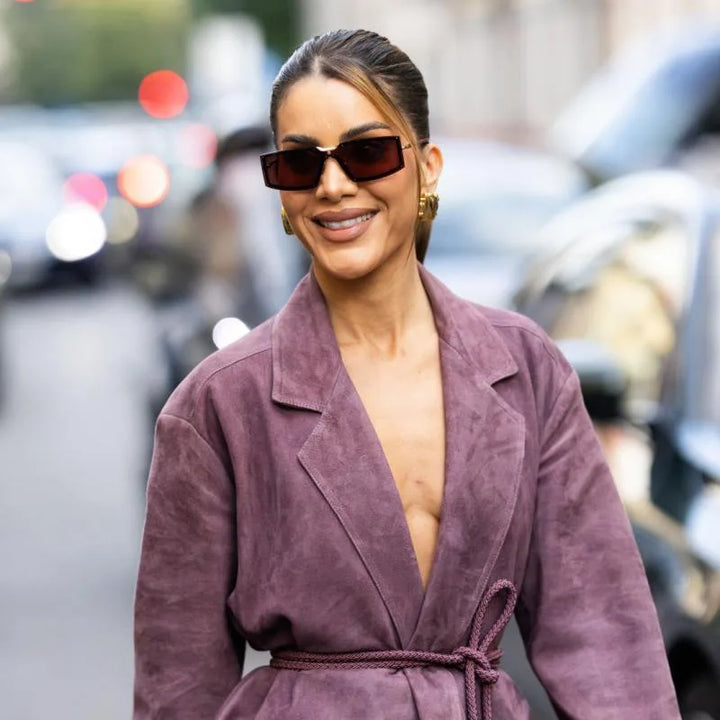 MM0118 sunglasses with dark burgundy rectangular lenses and slim frame, worn on a model.