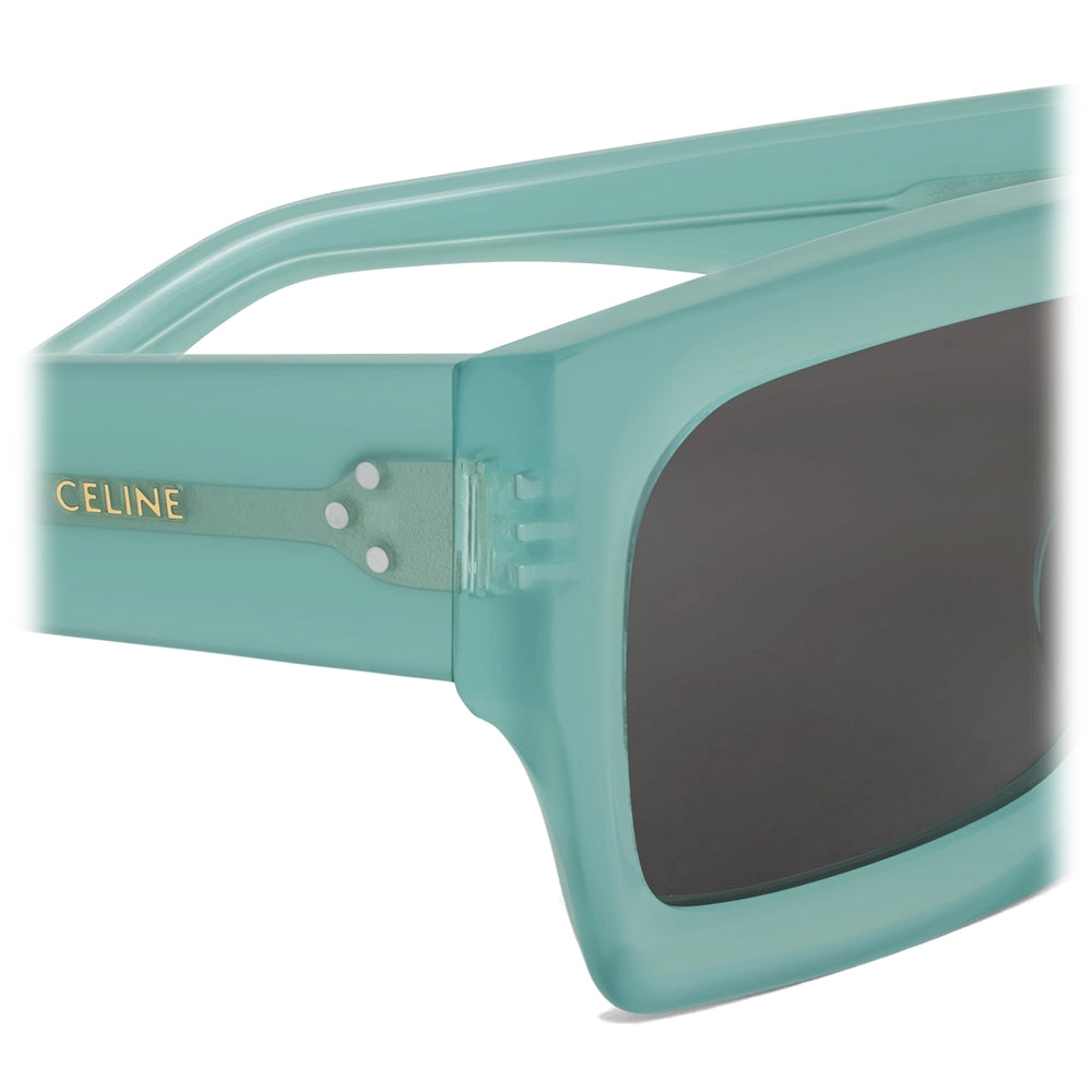 Celine square sunglasses side view with transparent green temple and dark lens