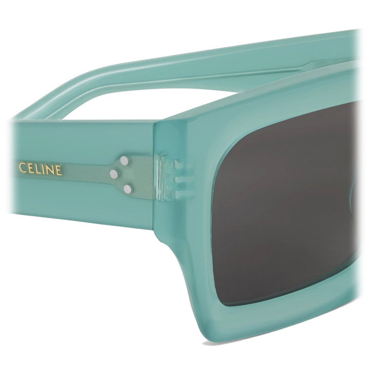 Celine square sunglasses side view with transparent green temple and dark lens