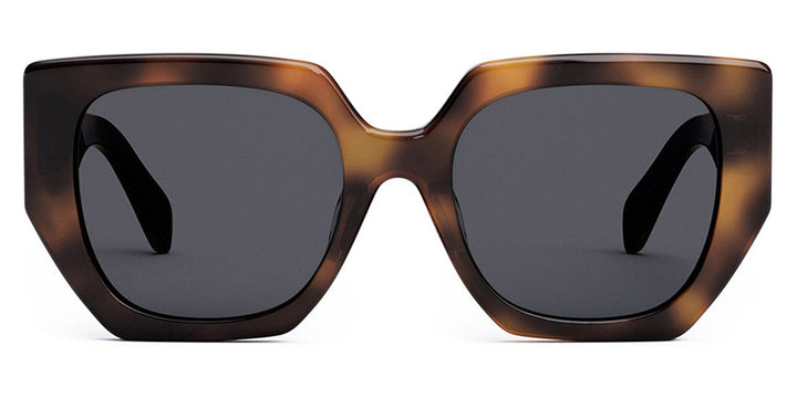 Square cat-eye sunglasses, brown tortoise acetate with dark lenses and gold emblem at center