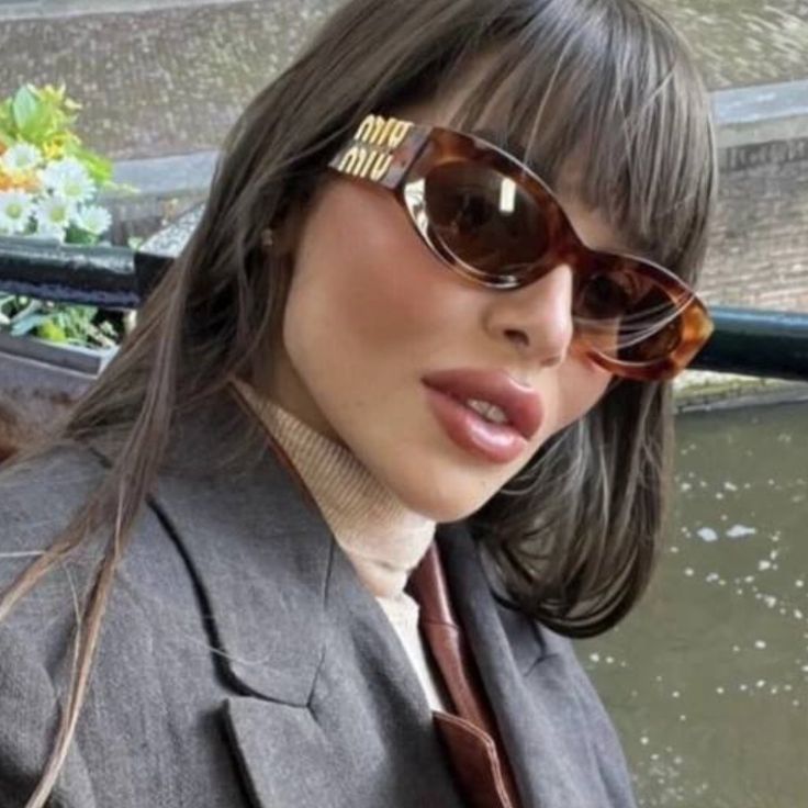Miu Miu MU11WS Honey Havana Oval Sunglasses | Designer Daydream