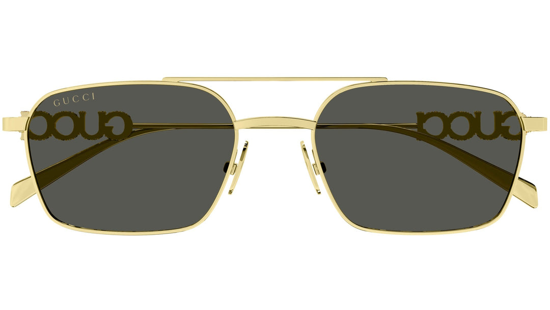 Gold metal sunglasses with dark lenses and Gucci logo on the lenses