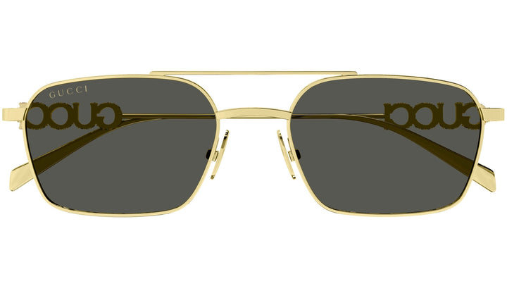 Gold metal sunglasses with dark lenses and Gucci logo on the lenses