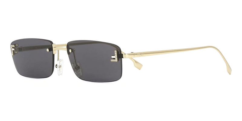 Rimless sunglasses with dark lenses and gold metal frame, black temple details