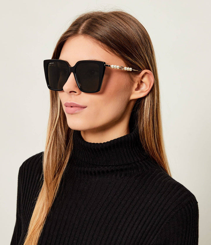 Gucci GG1257S Gafas de sol redondeadas con lentes marrones y rojos