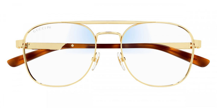 Gucci gold pilot sunglasses with tortoise temples and photochromic lenses