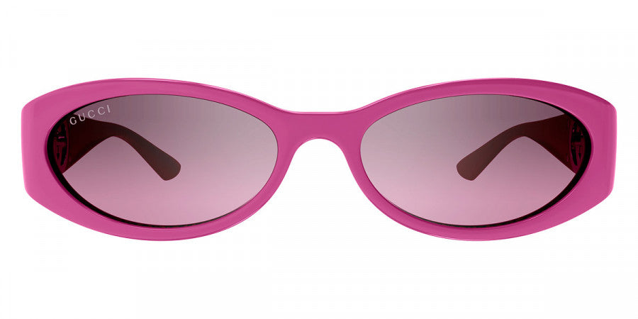 Gucci pink oval sunglasses, front view with tinted lenses
