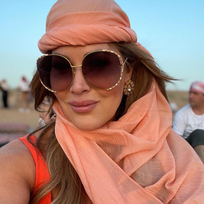 Gucci GG0595S Oversized Cutout Round Sunglasses in Brown Gradient