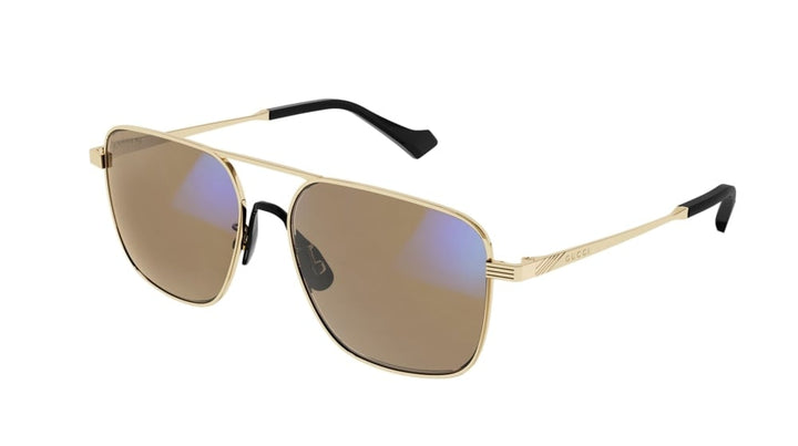 Gucci gold metal pilot sunglasses with photochromic lenses and black temple tips