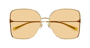 Gucci gold-tone square sunglasses, front view, amber tinted lenses
