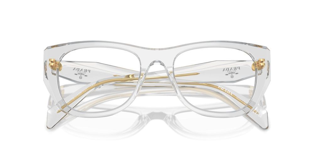 Clear eyeglass frames with gold-tone accents and metal bridge detail