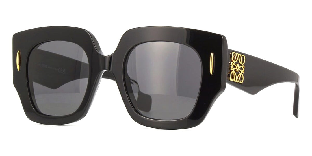 Loewe anagram sunglasses with black square frame and dark lenses, gold logo on arm