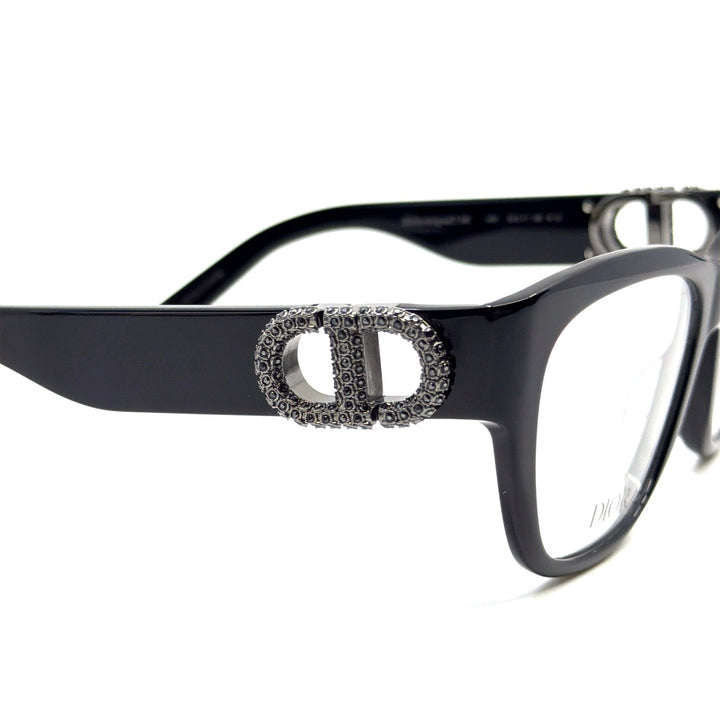 Black cat-eye eyeglass frames with large rhinestone Dior emblem detail
