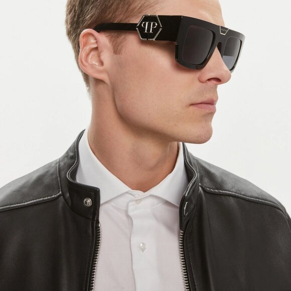 Philipp Plein square sunglasses on a model face, black frame with dark lenses