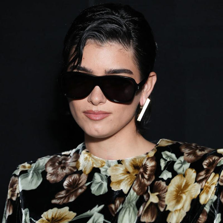 Saint Laurent SL609 black oversized sunglasses with dark lenses, front close-up