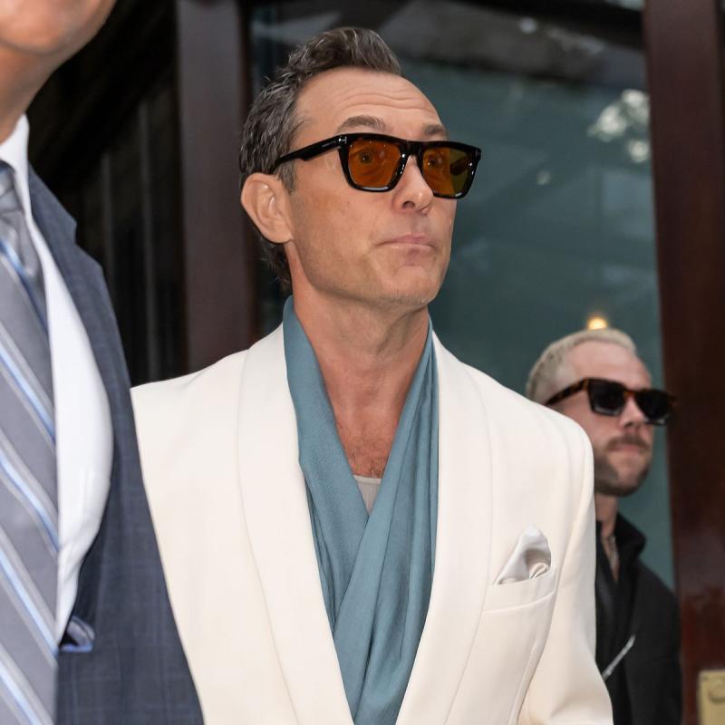Square dark Havana sunglasses with amber lenses and branded temple accents
