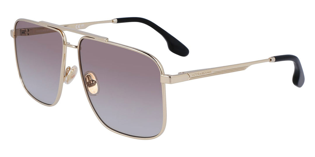 Aviator sunglasses with gold metal frame and pink gradient lenses, black temple tips