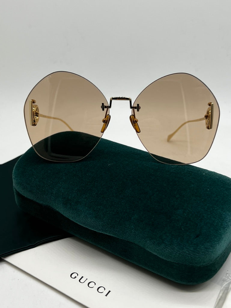 Gucci GG1203S Brown Gold Rimless Sunglasses