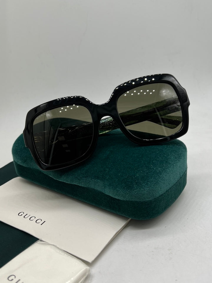 Gucci GG0036SN Gafas de sol cuadradas con patas a rayas y purpurina
