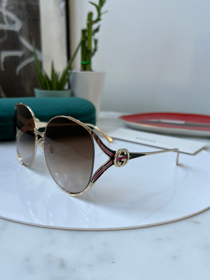 Gucci GG0225S Oversized Cutout Metal Sunglasses in Rose Gold