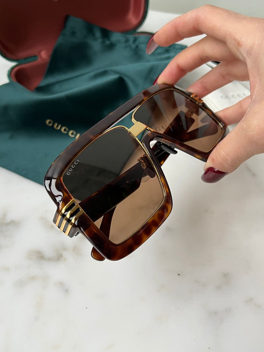 Gafas de sol estilo aviador extragrandes en marrón Gucci GG0900S