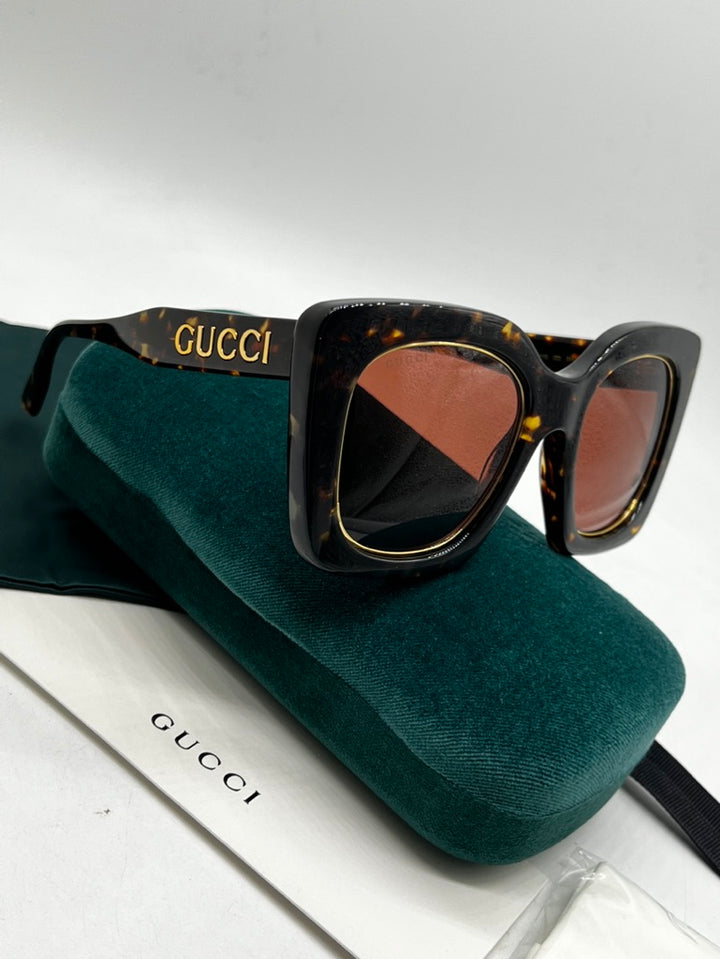 Gucci GG1151S Gafas de sol extragrandes en dorado marrón