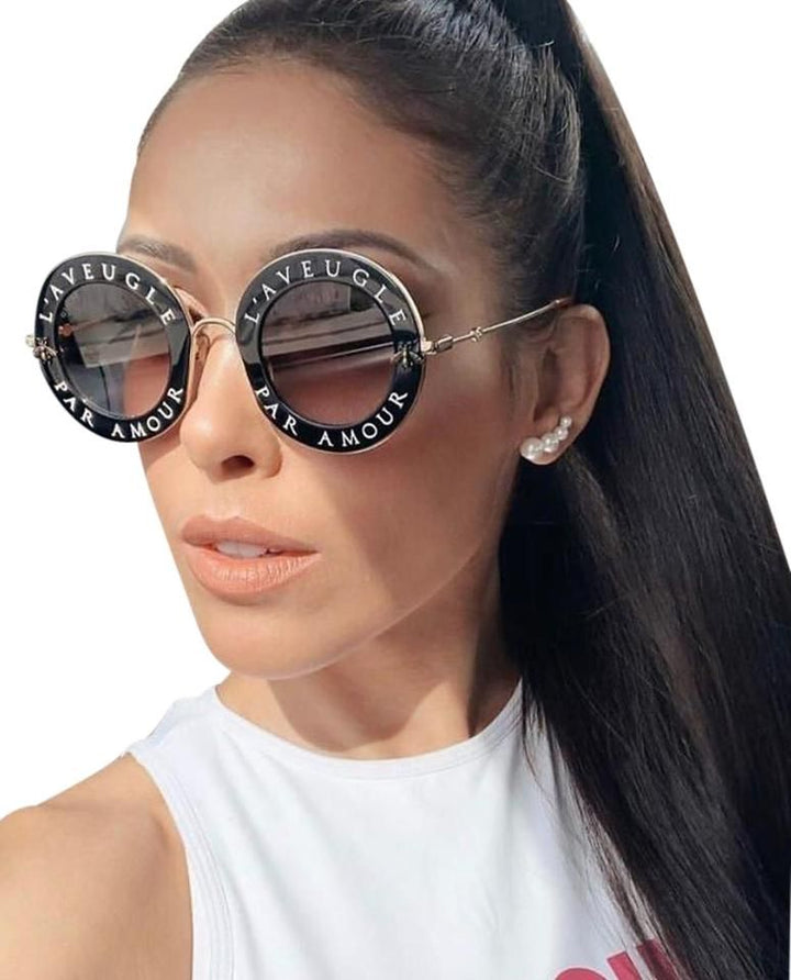 Gucci GG0113S Blind For Love Gafas de sol redondas negras