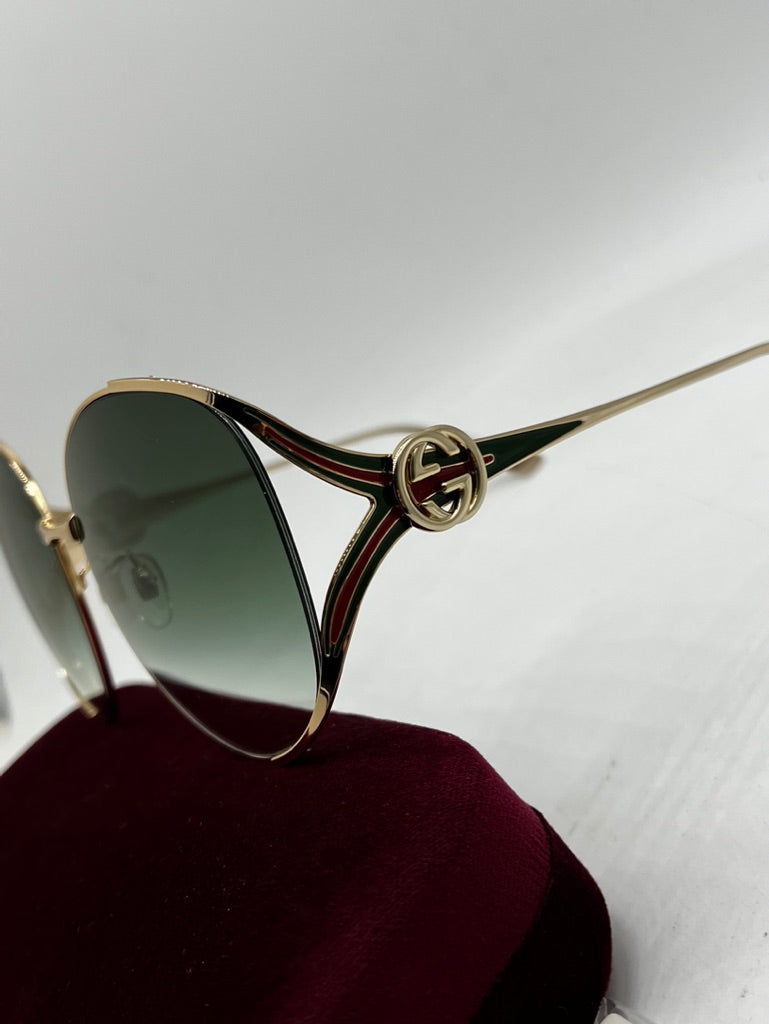 Gucci GG0225S Oversized Cutout Metal Sunglasses in Green Gradient