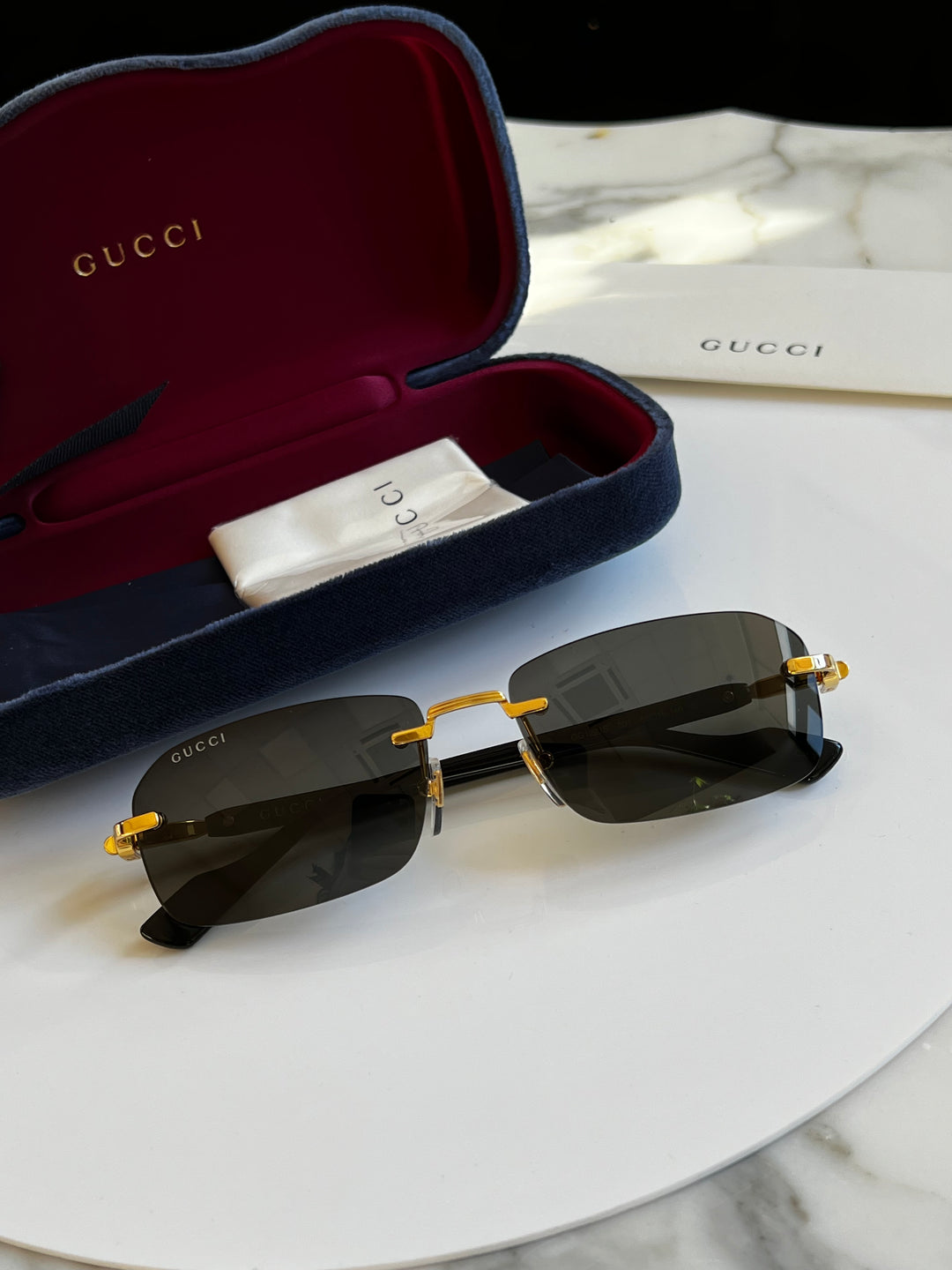 Gucci GG1221S Gafas de sol grises sin montura