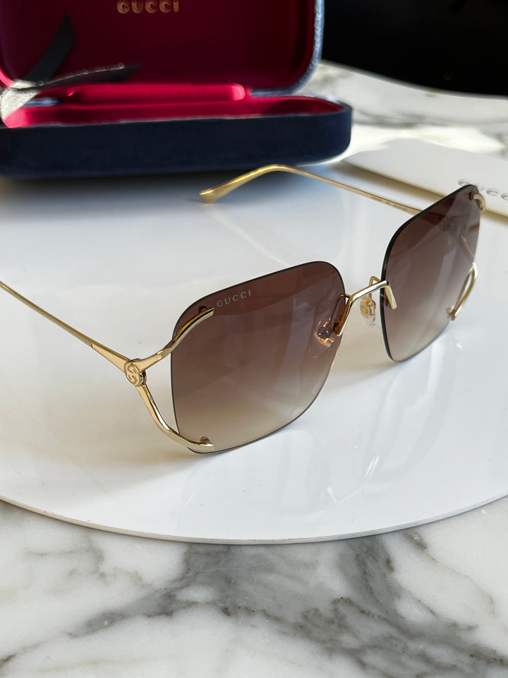 Gucci GG0646S Rimless Oversized Sunglasses in Brown Lens