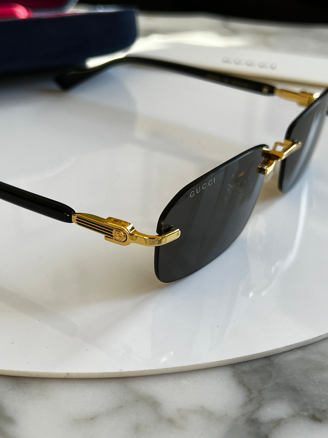 Gucci GG1221S Grey Rimless Sunglasses