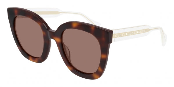 Havana brown cat-eye sunglasses with clear temples and dark tinted lenses