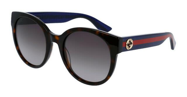 Gucci GG0035SN Gafas de sol redondas con patas a rayas y purpurina